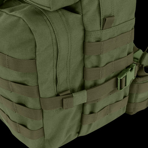 Close-up of the Condor Medium Assault Backpack 30L in green, featuring multiple webbing straps, zippers, and a plastic buckle—ideal for outdoor or military use.